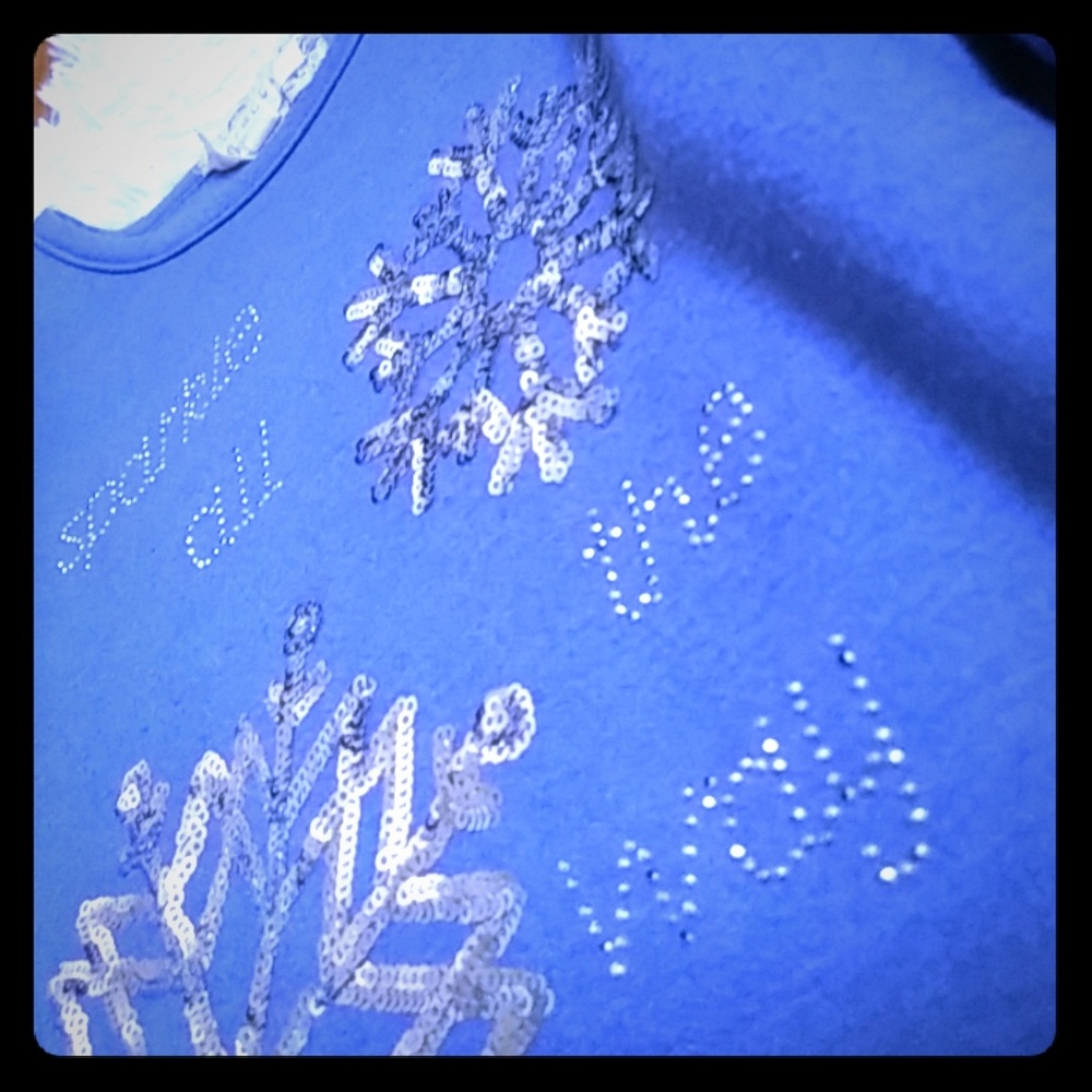 Blue off the shoulder long sleeved shirt